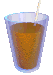 a glass of orange juice being sipped on